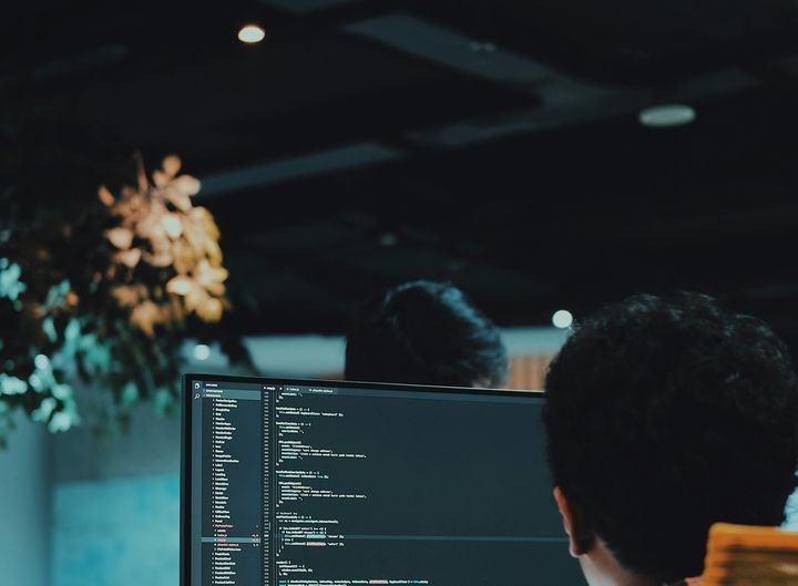 Developers working in an office in the evening